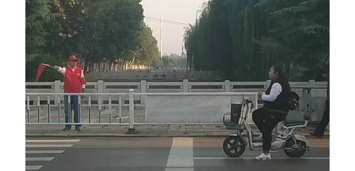 县房管局积极开展文明志愿者活动
